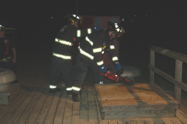 September 23, 2009: Probationary FF/EMT Pat McGhee uses the Cutters Edge saw on the roof prop.